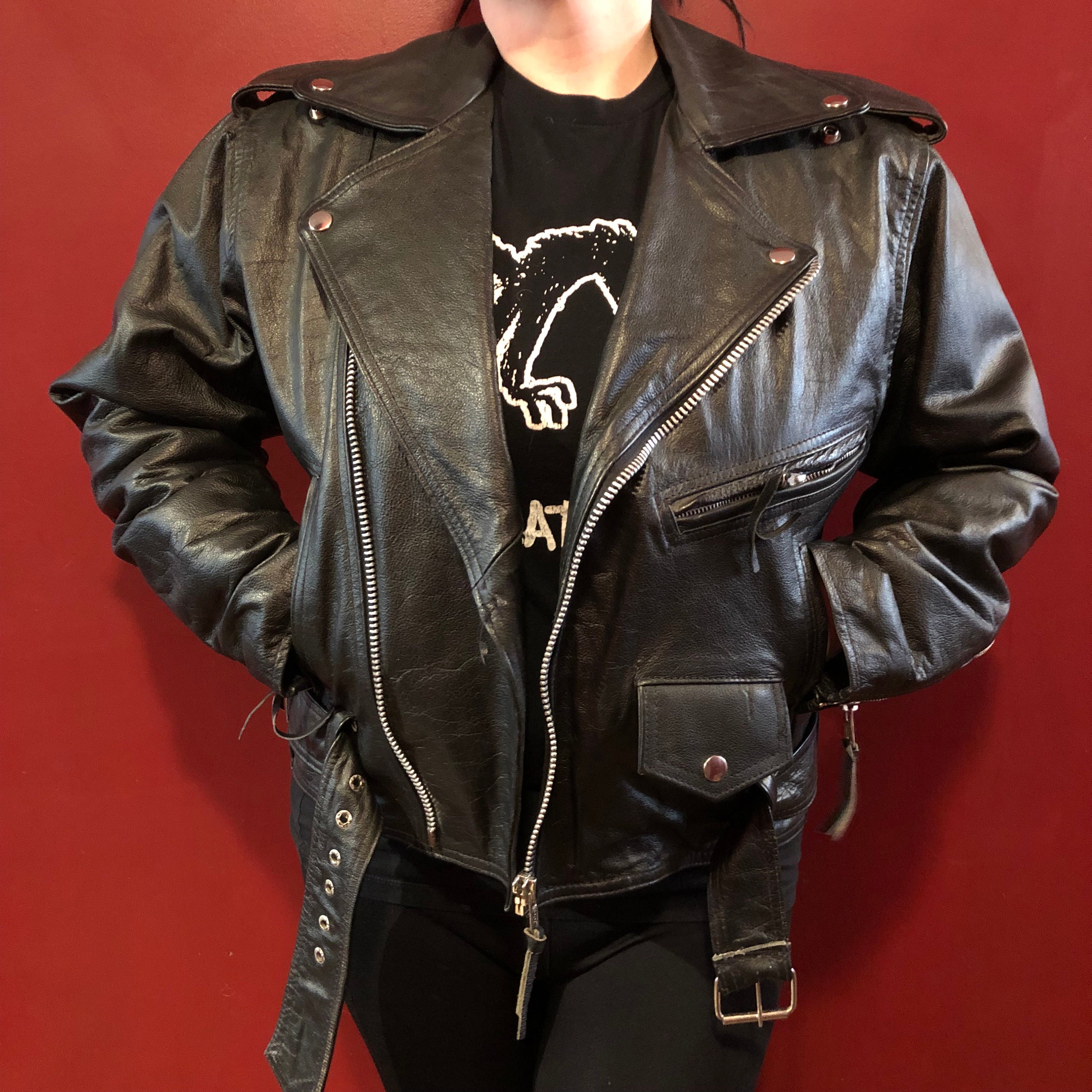Leather jacket biker slut sucking cock photo