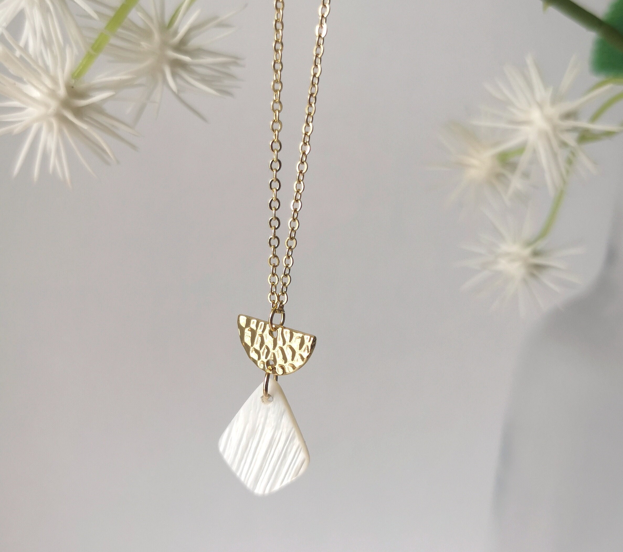 Delicate Art Deco Inspired Necklace With Half Moon Textured Brass & White Natural Shell Kite Charm On A Gold Plated Fine Chain
