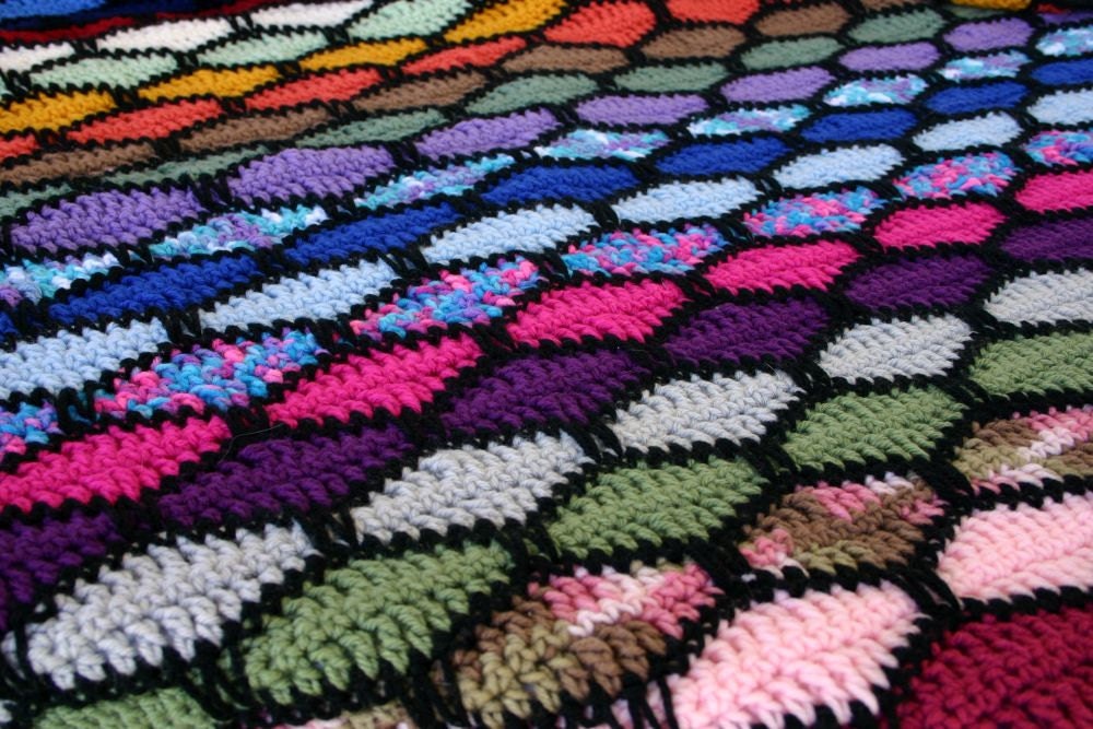 Knit strip afghan