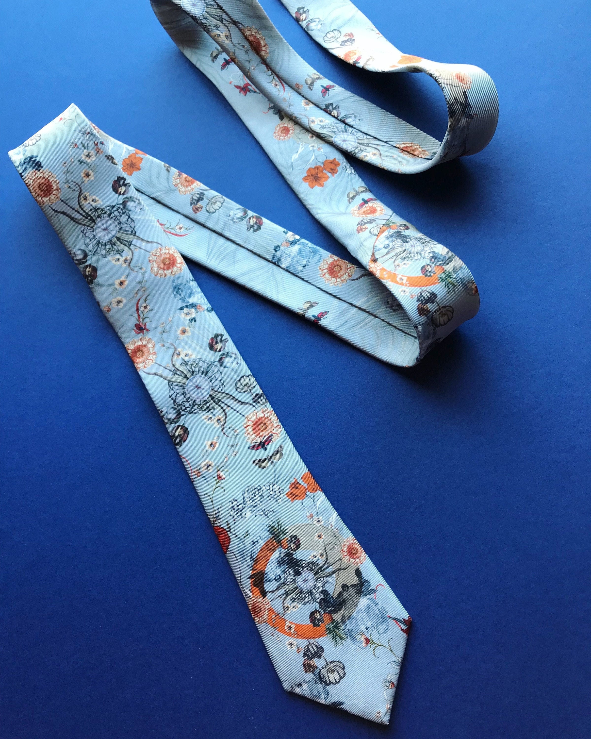 Light Blue Silk Tie With Floral Pattern