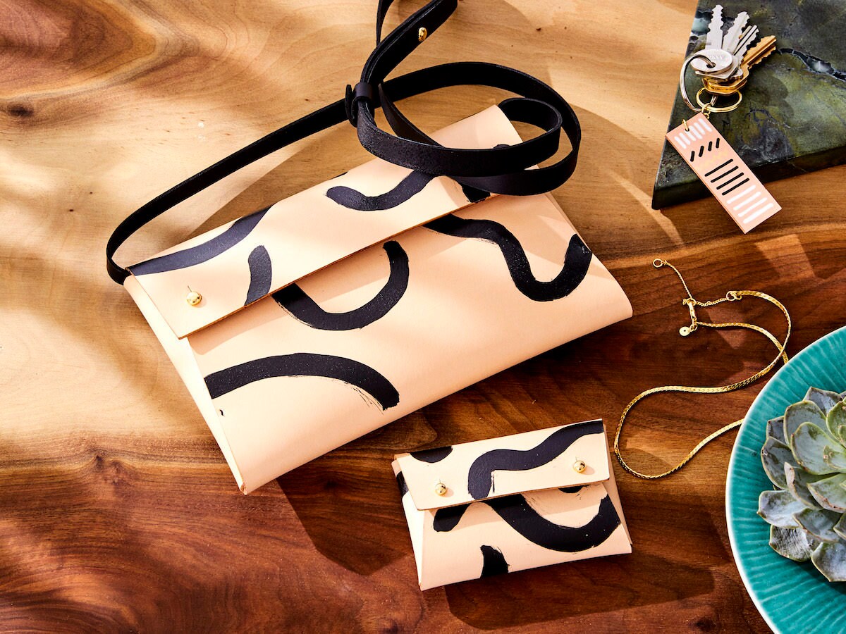Painted leather purse, wallet, and keychain from Klés