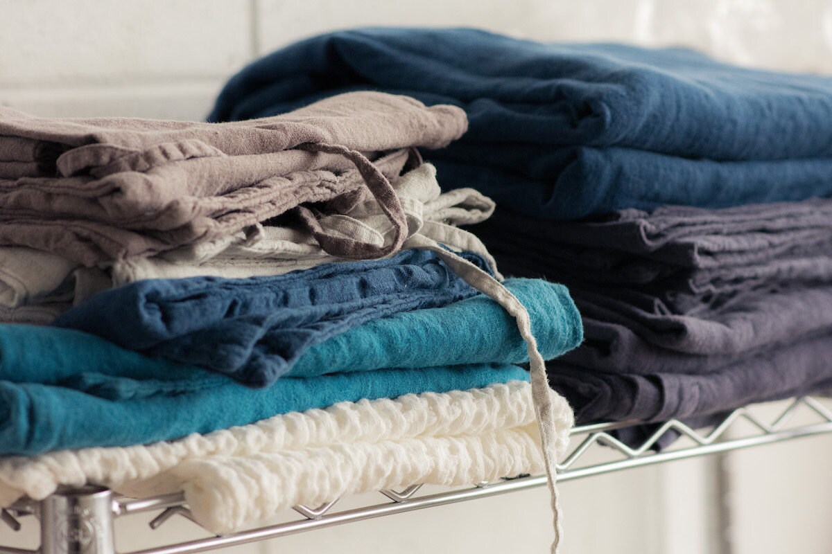 Linen stacked in the House of Baltic Linen studio