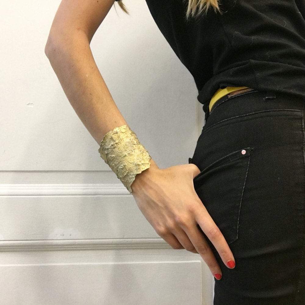 A cuff bracelet modeled after pine bark from Mai Solorzano