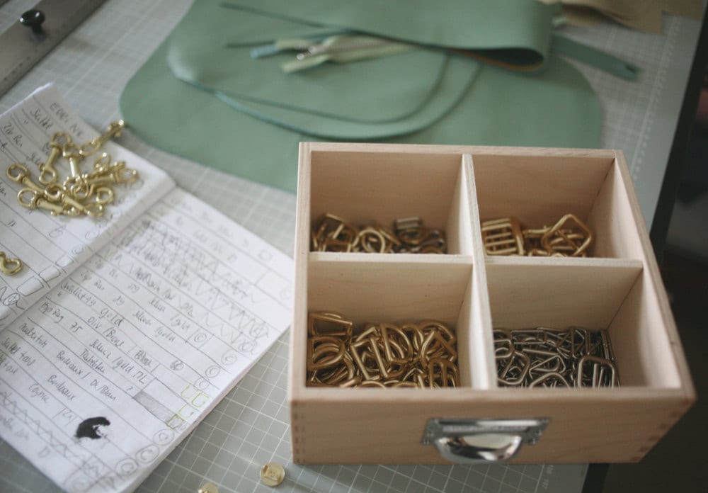 A drawer full of gold and silver fittings