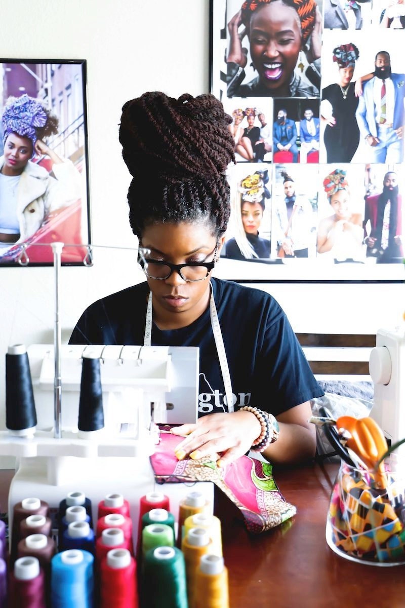 GabeJade seller Ade Ogbomo sewing one of her pieces in her Texas studio