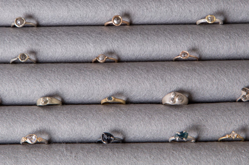 Assorted rings from Tamara Gomez, stored in tidy rows