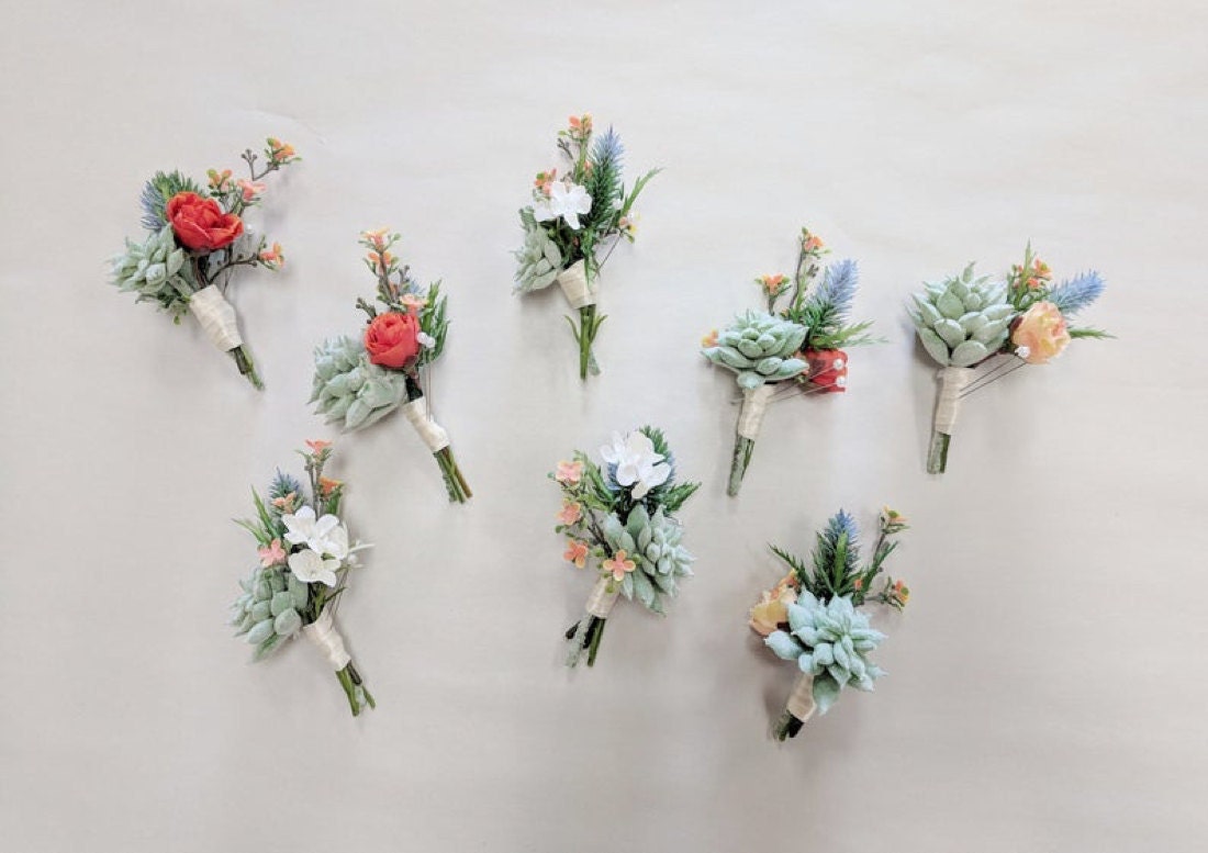 A sample of assorted succulent boutonnieres from The Faux Bouquets