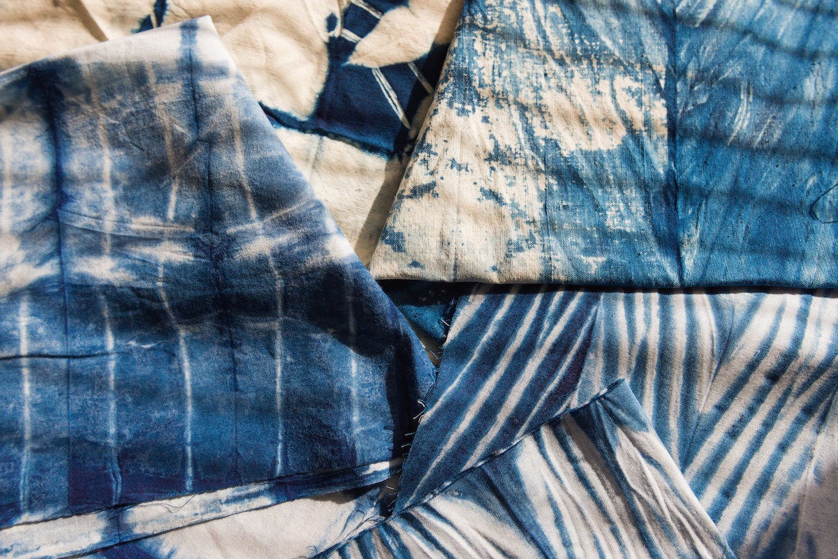 An array of hand-dyed indigo fabrics