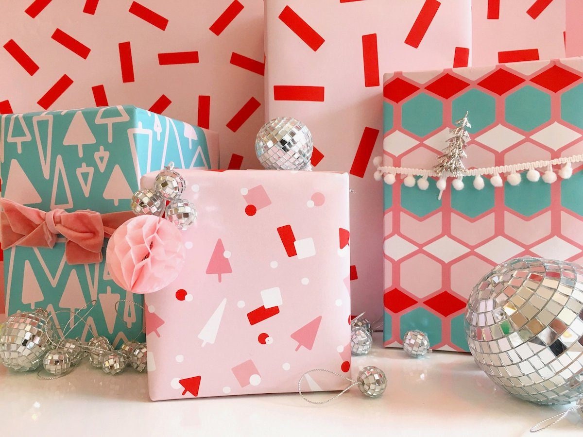 Festively wrapped holiday packages in neon bright colors