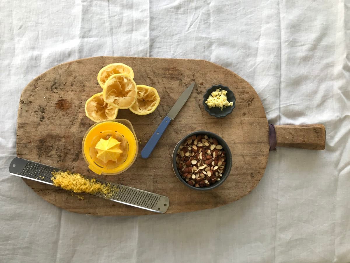 Lemon juice, lemon zest, and almonds awaiting use