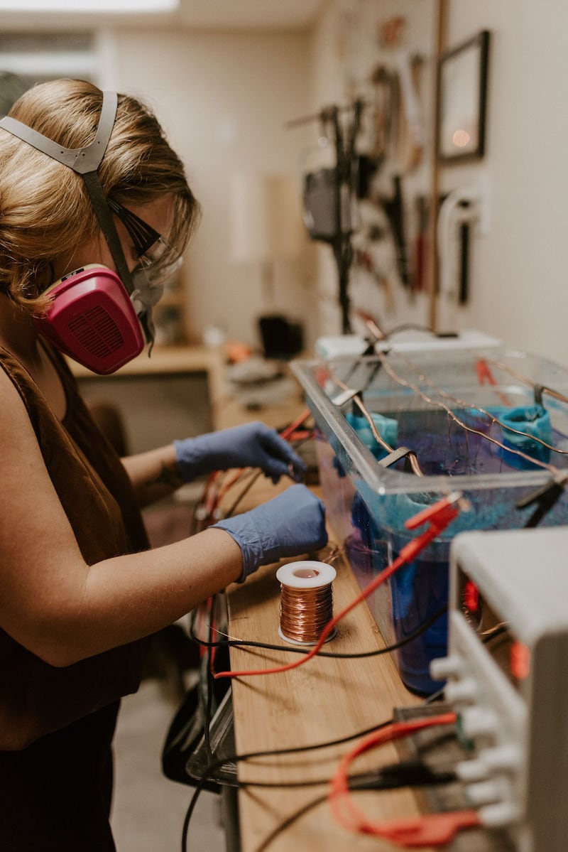 Alicia at her electroforming station in her studio