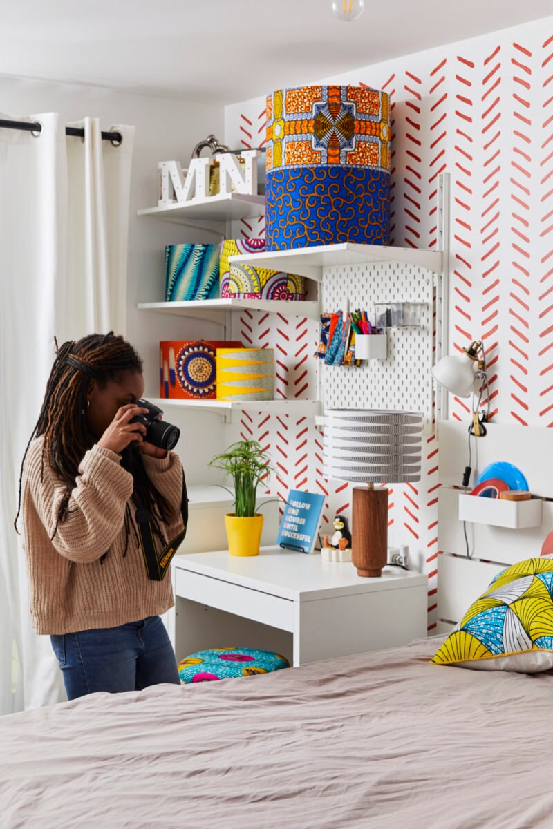 Natalie photographs her products, (in this case, throw pillows) in her London studio