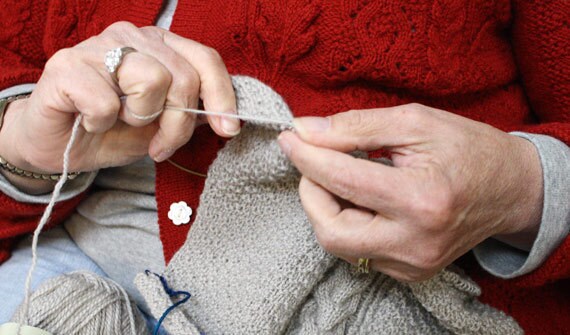 570_Lisa_Wilcox_Case_knitting_wearing_sweater_she_knit_detail
