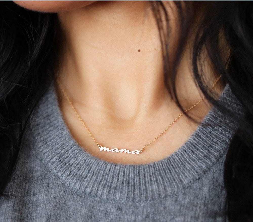 A gold "mama" necklace Mother's Day gift from EVREN
