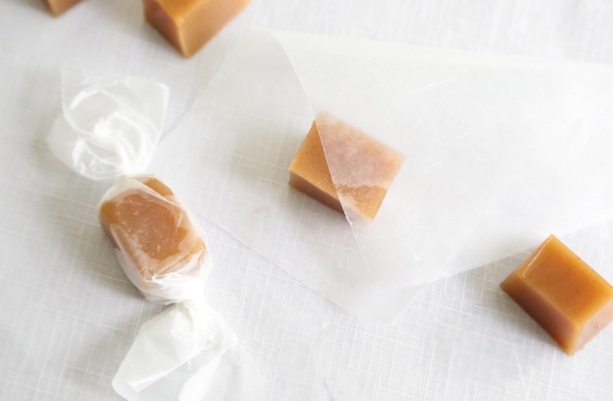 Wrapping the cut caramels in waxed paper