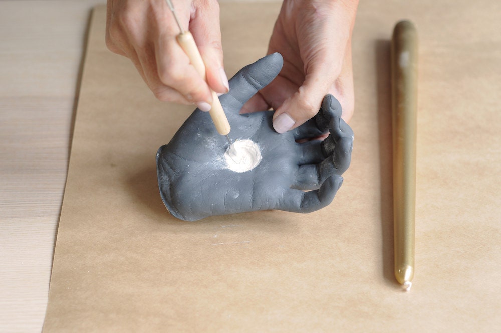 Carving out a niche to hold a candle