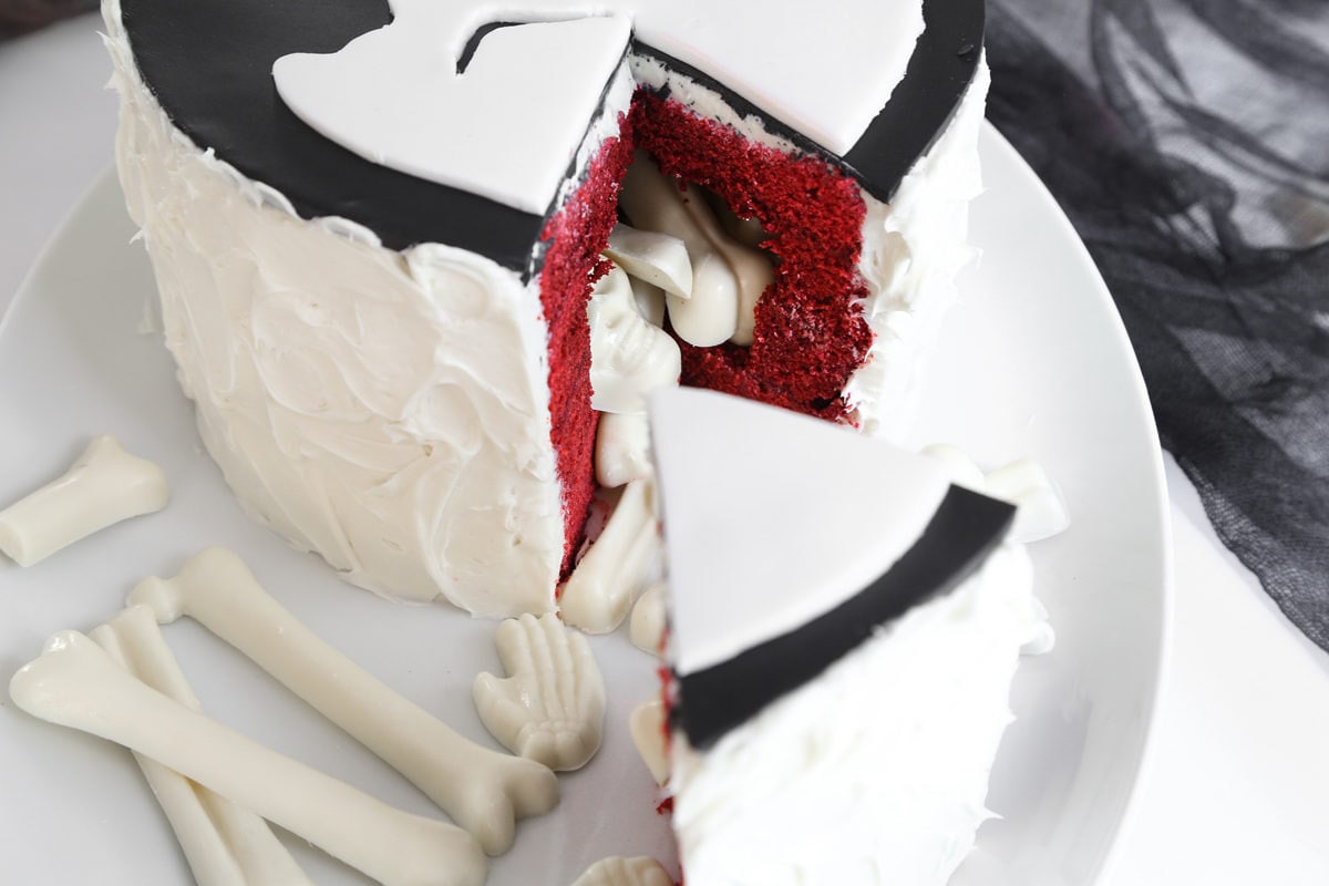 A homemade red velvet skeleton cake