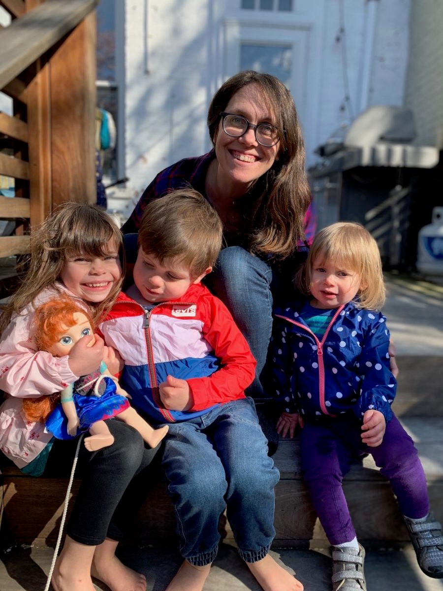 A portrait of Etsy VP of Global Public Policy and Impact Althea Erickson with her 3 children
