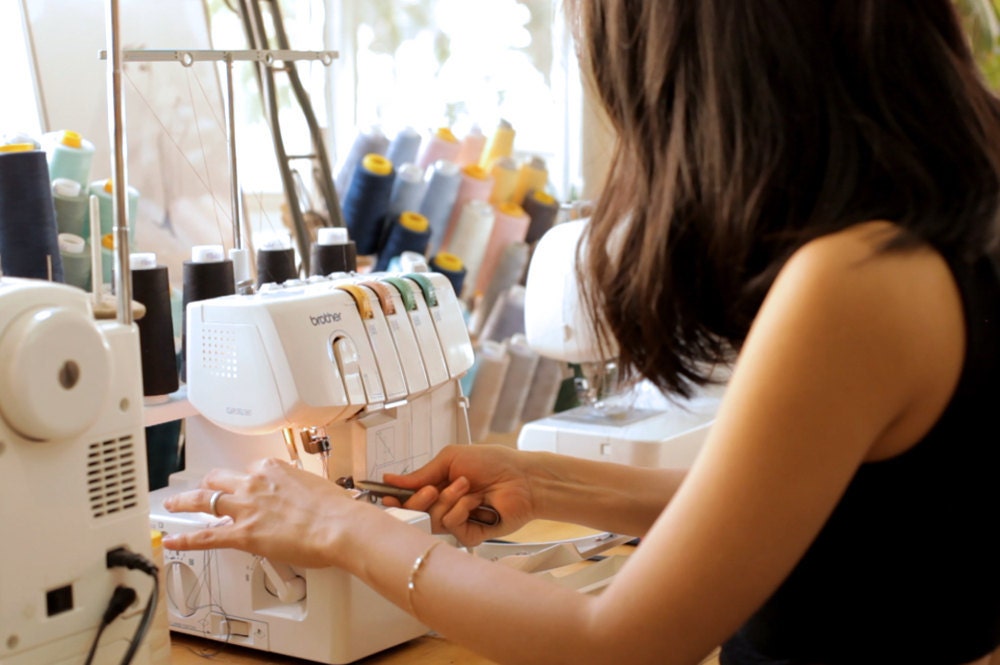 Elma at work on her sewing machine