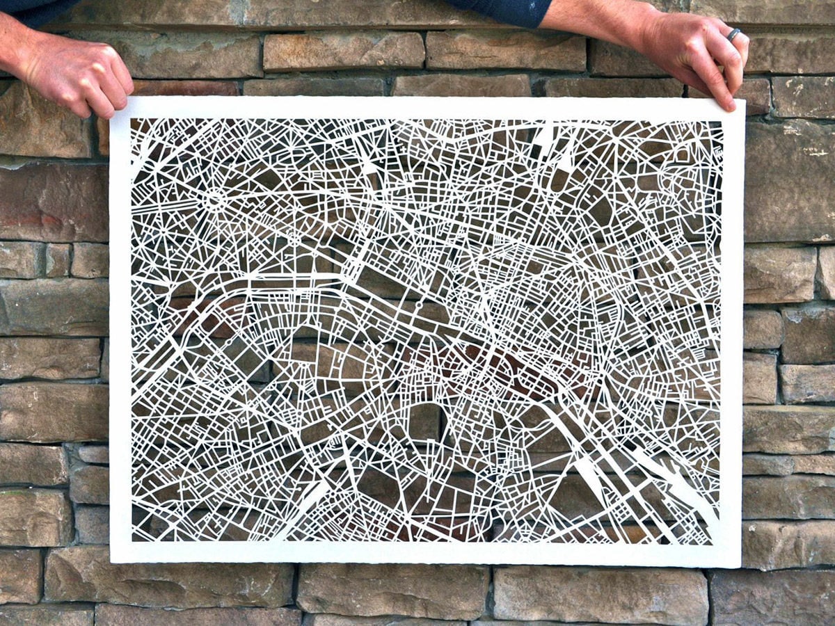 A large paper cut map of Paris from Studio KMO