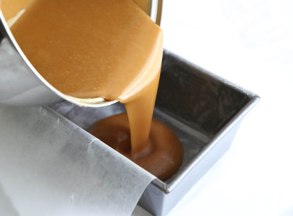 Pouring cider caramel into the pan