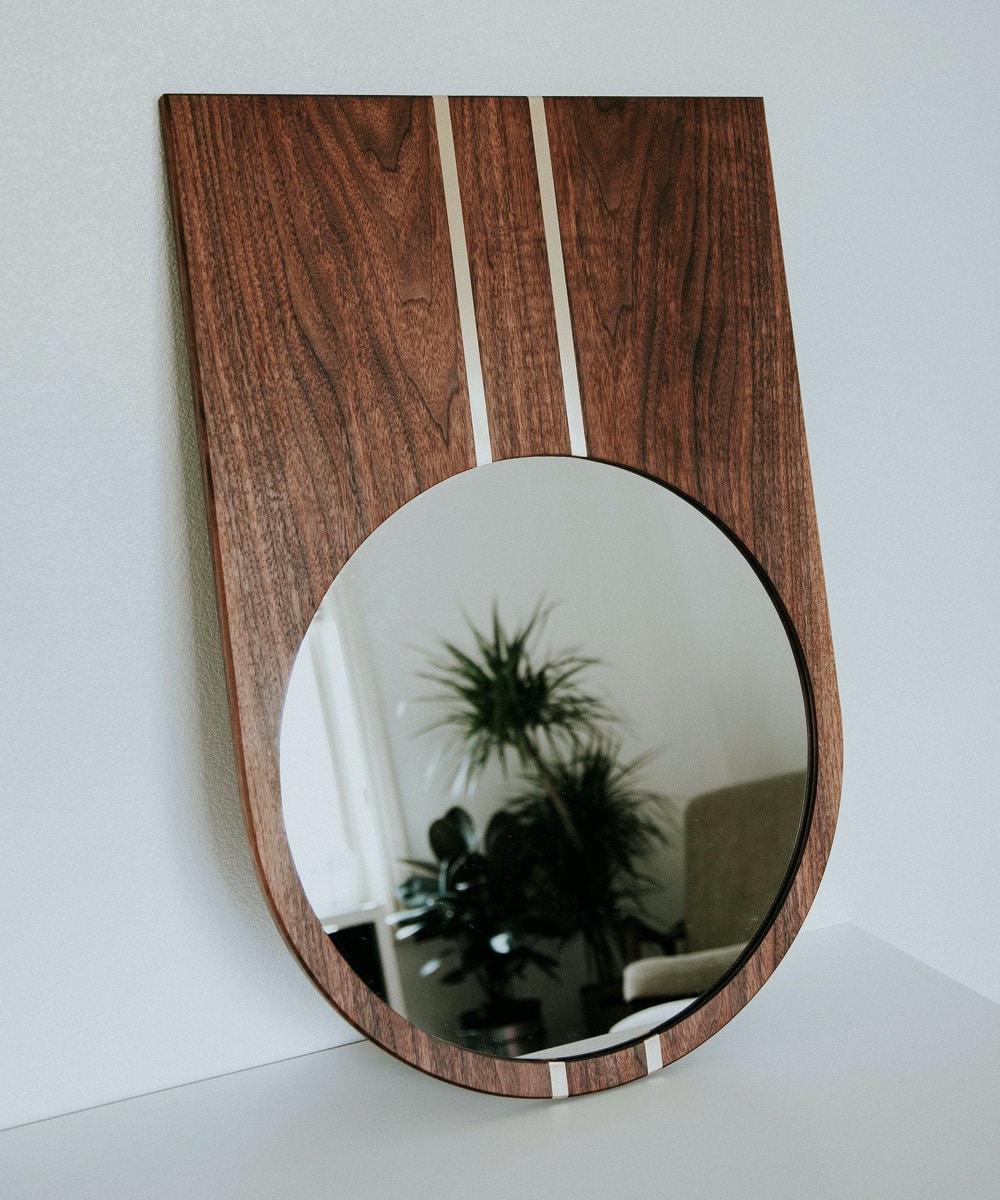 Wood-framed wall mirror from Szklo Glass
