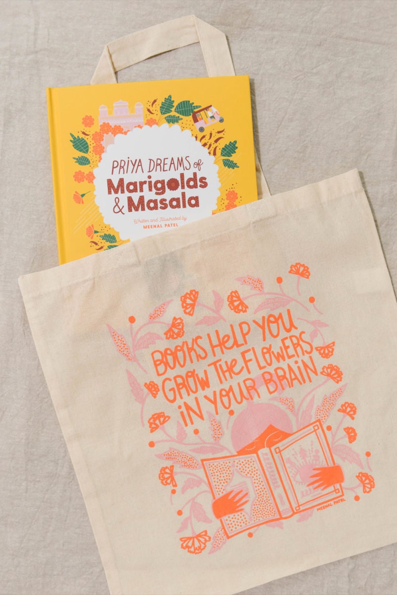 Meenal's book, "Priya Dreams of Marigolds and Masala" tucked into one of her "books help you grow" totes
