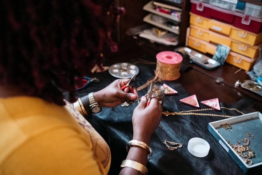 Alicia at work on a piece of jewelry