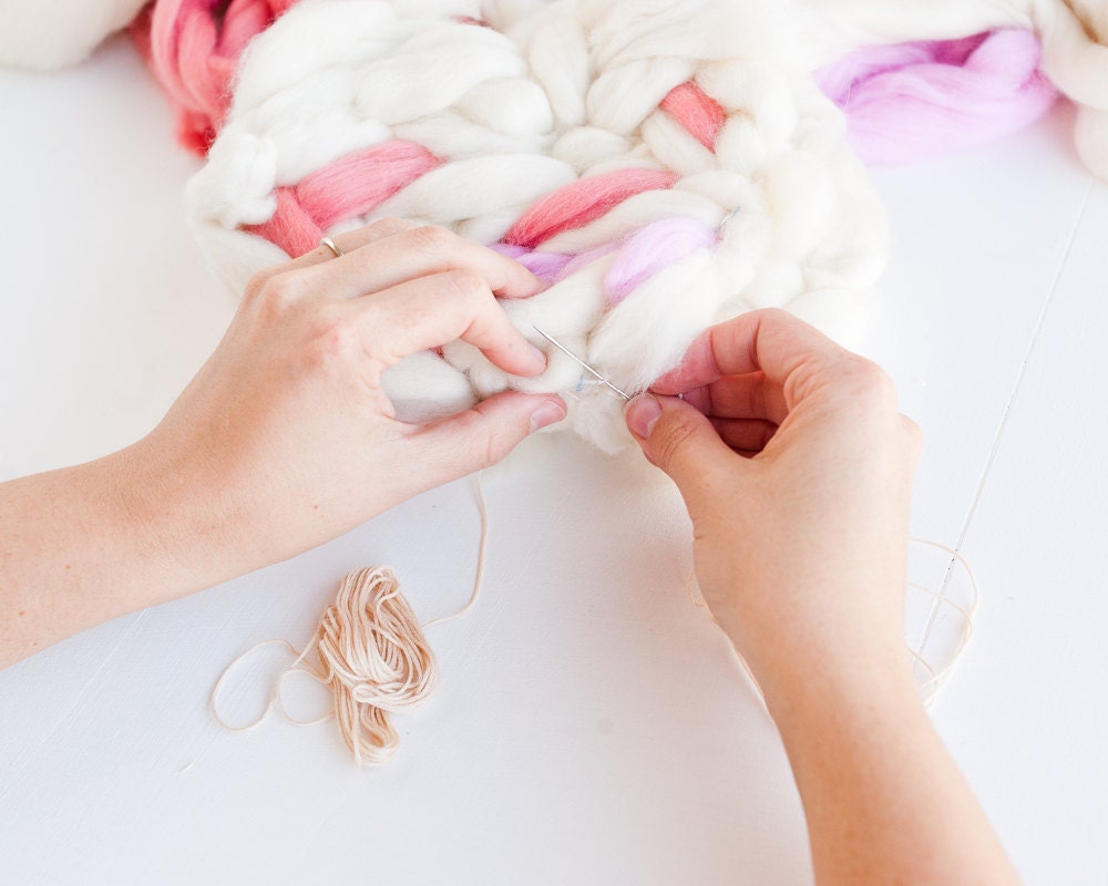 Tying the front and back circles together with embroidery floss