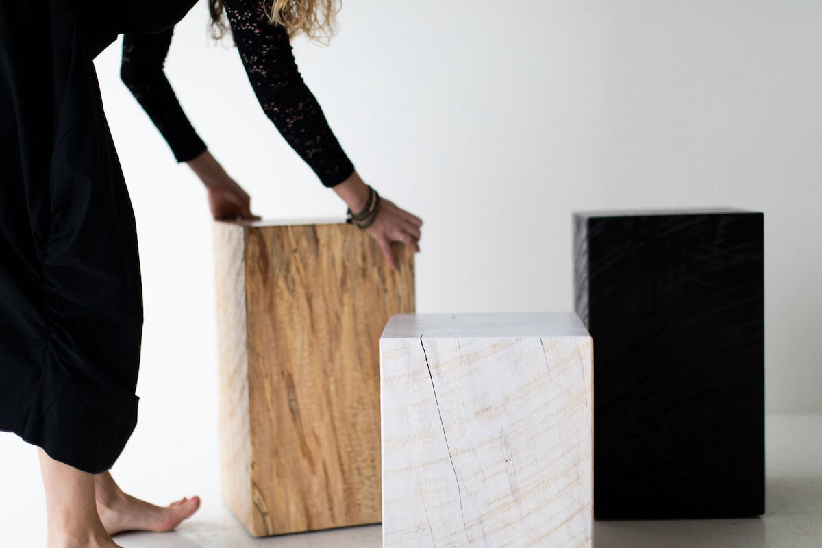 A trio of Bertu Home tree stump tables