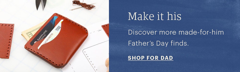 An image of a DIY leather wallet alongside a banner with a blue background that reads "Make it his. Discover more made-for-hiim Father's Day finds", with a CTA that reads "Shop for Dad"