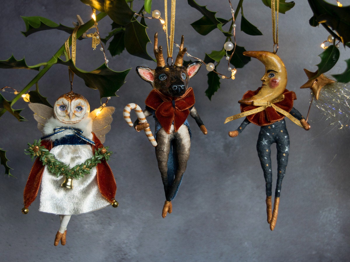 Animal ornaments from Kayleigh Radcliffe hanging from a tree