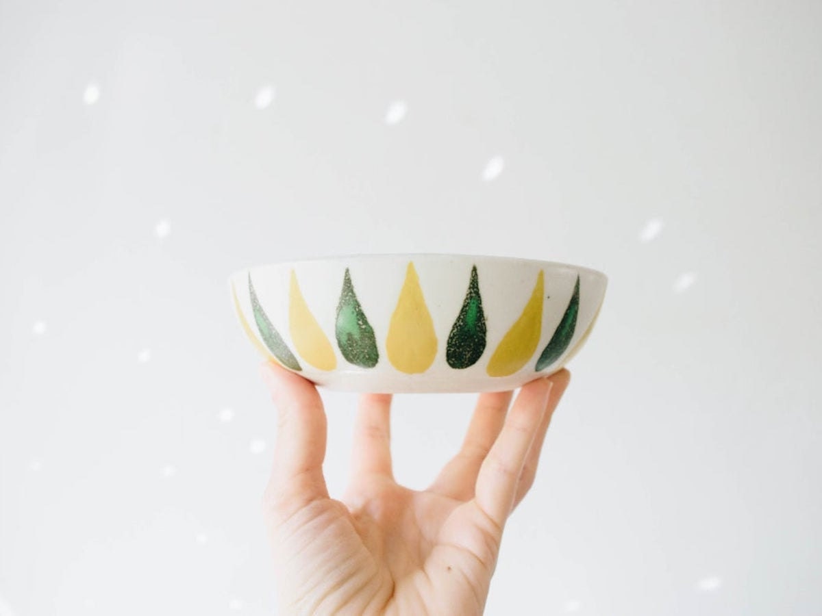 A decorative mid-century bowl from Glittery Moon Vintage