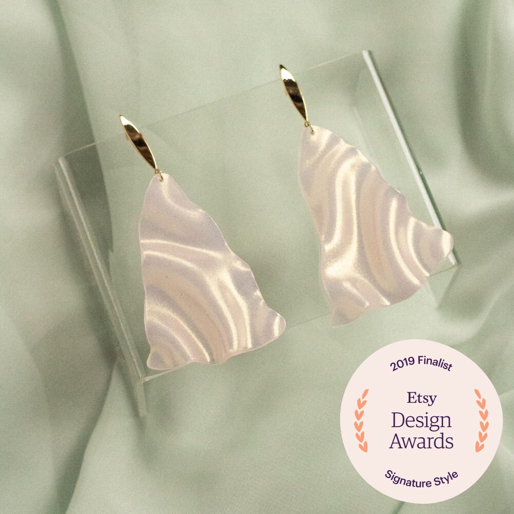 Iridescent statement earrings from Elysian Theory