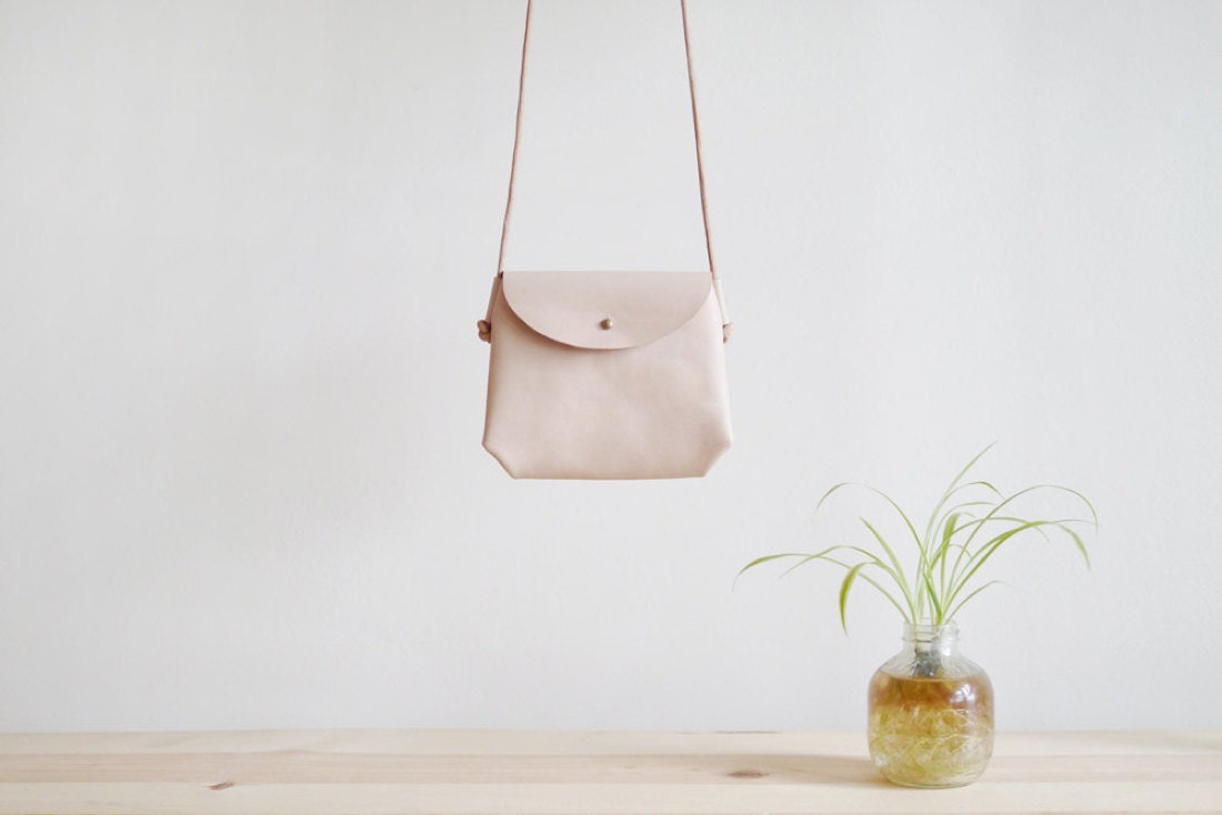 Mini crossbody sling in natural nude from Small Queue