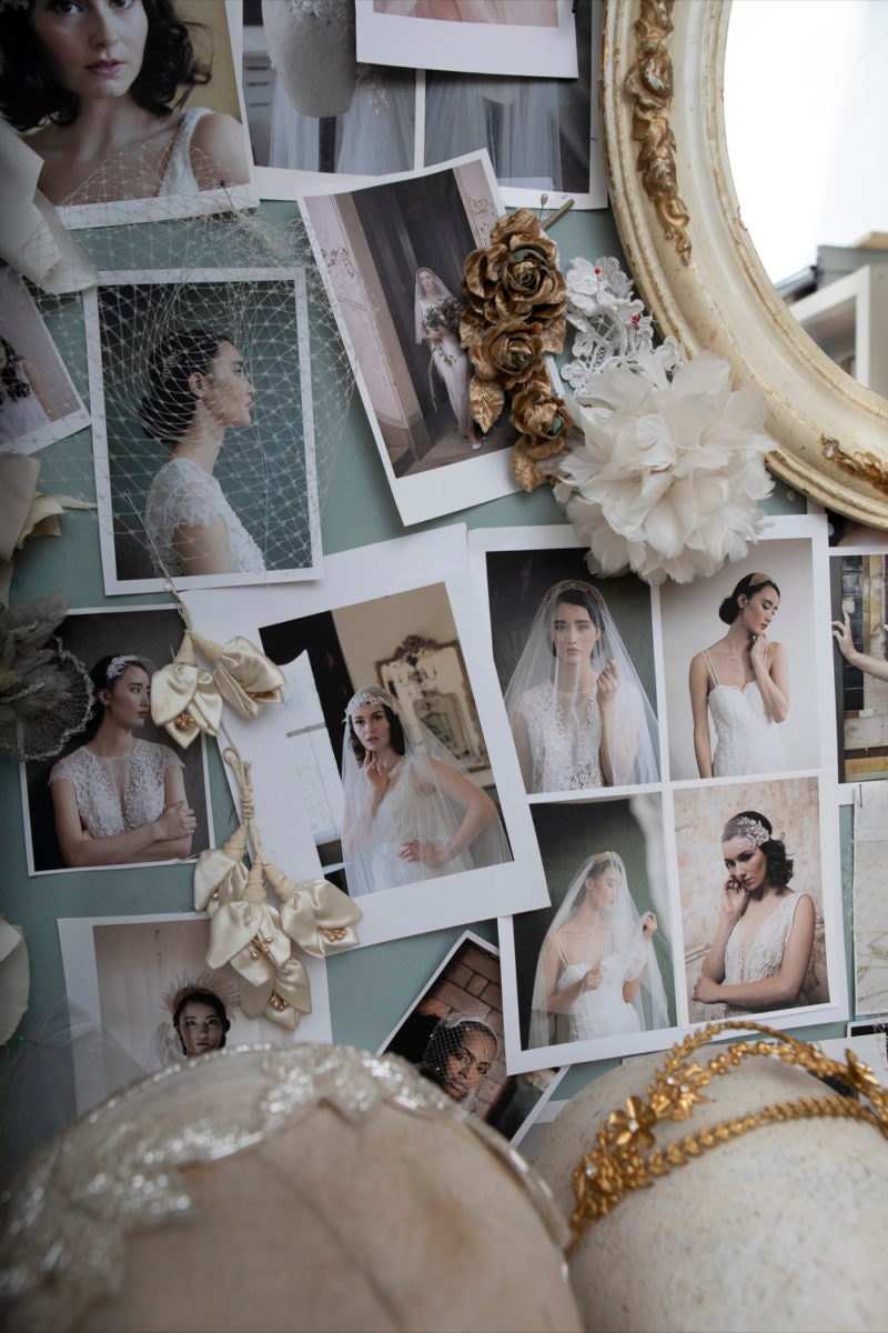 Closeup of photographs pinned to Rae's mood board.