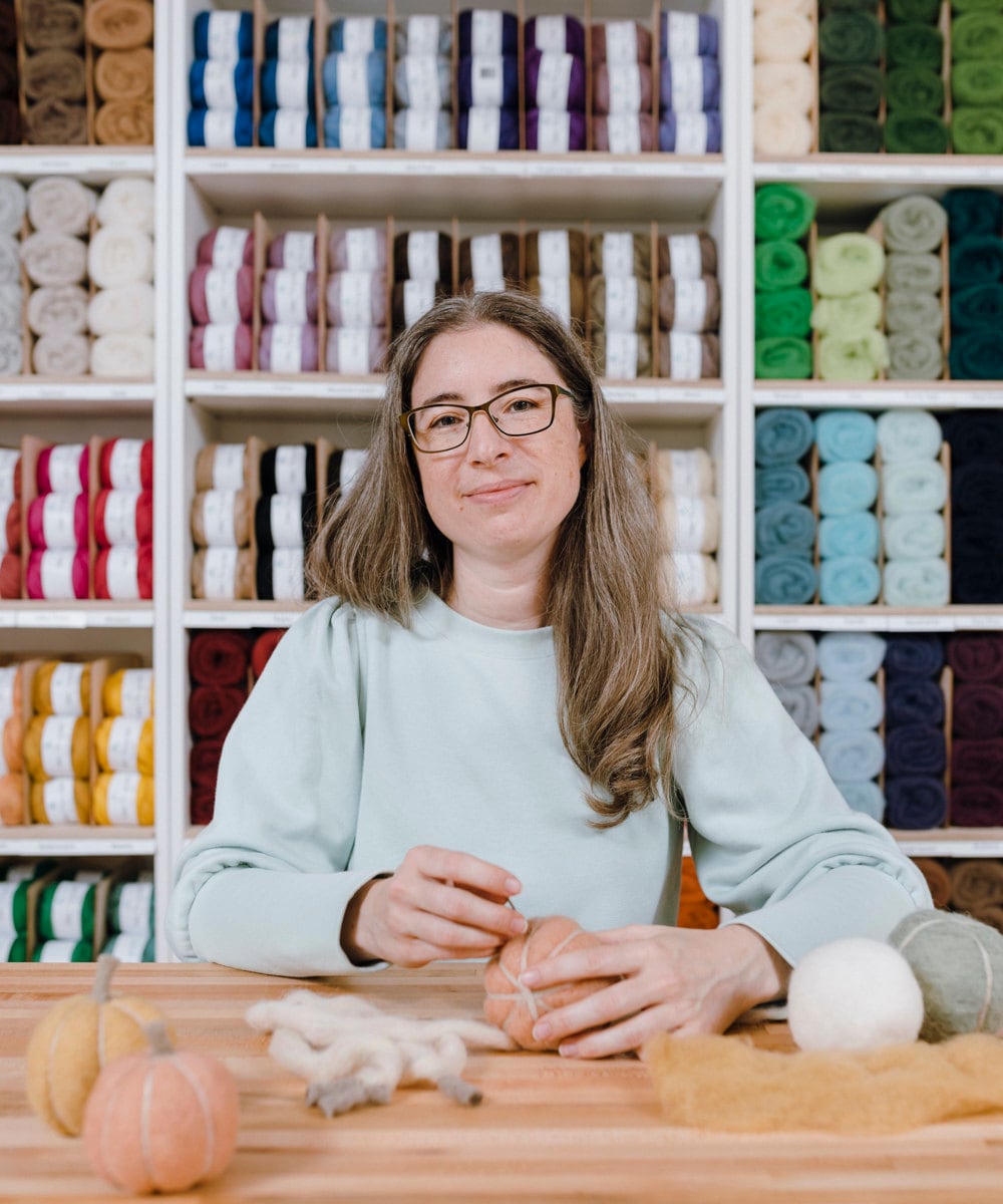 A portrait of needle felting kit seller Elizabeth Whitton in her Michigan studio.