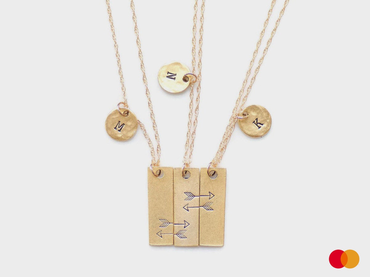 A hand-stamped triple-friendship necklace from Olive Bella.