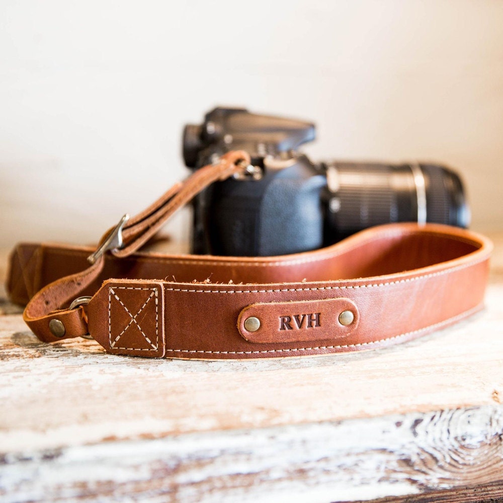 A personalized leather camera strap from Holtz Leather Co.