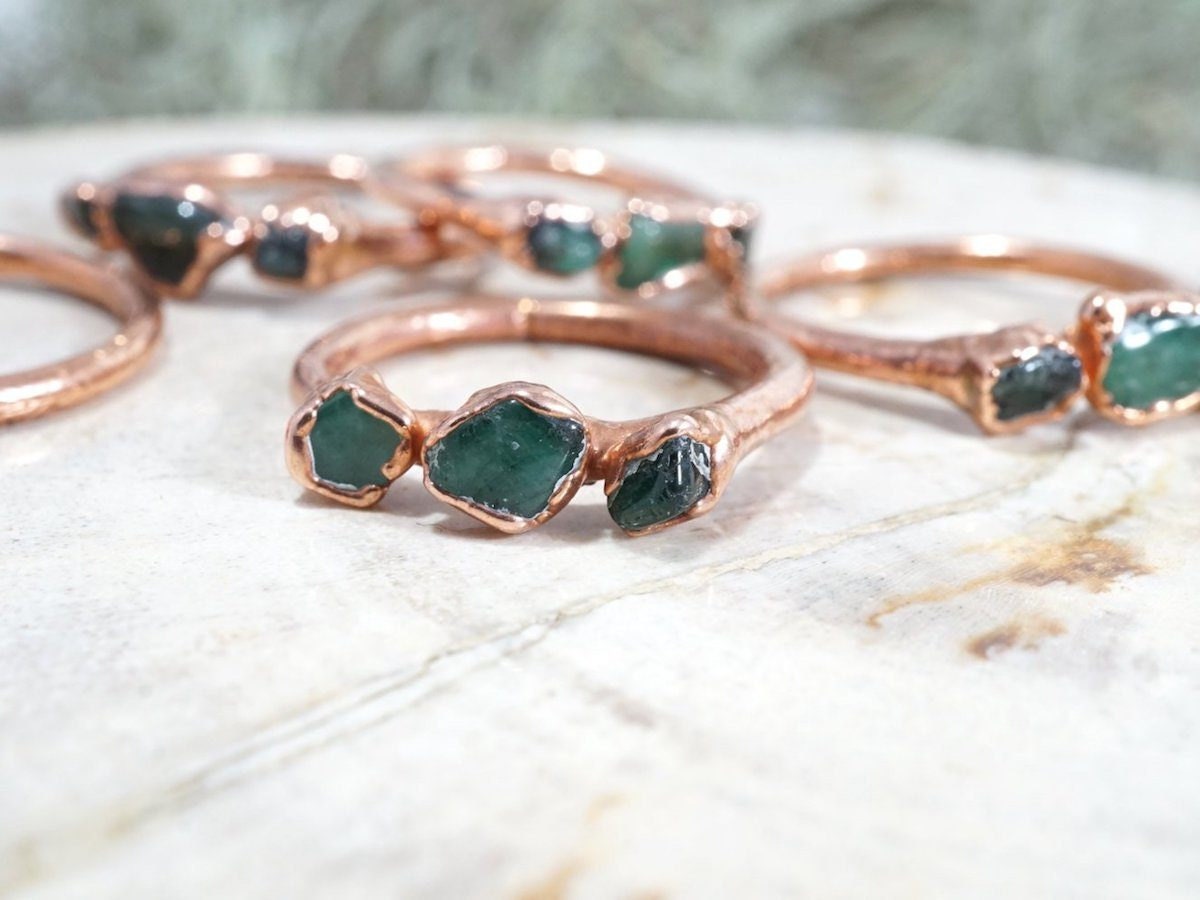 Raw emerald gemstone rings from Pebble & Stone