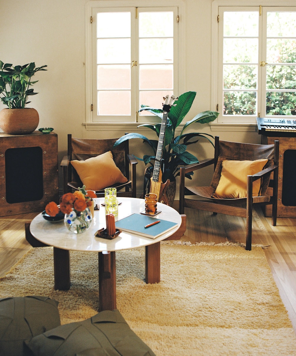 HAIM's home studio styled with a vintage Moroccan rug from Ounizz, from Etsy