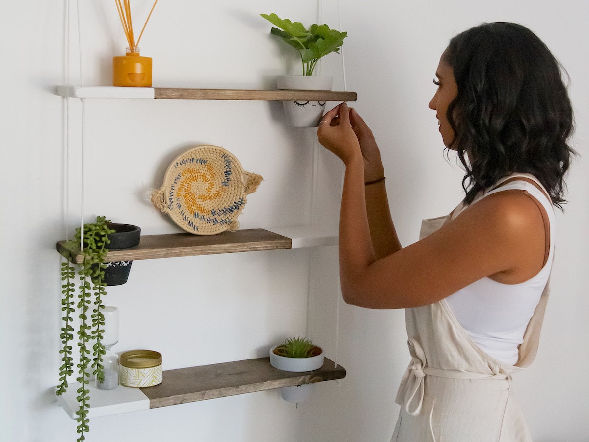 TheCraftySwirl shop owner Ilana Mayes styles one of her signature two-tone shelves.