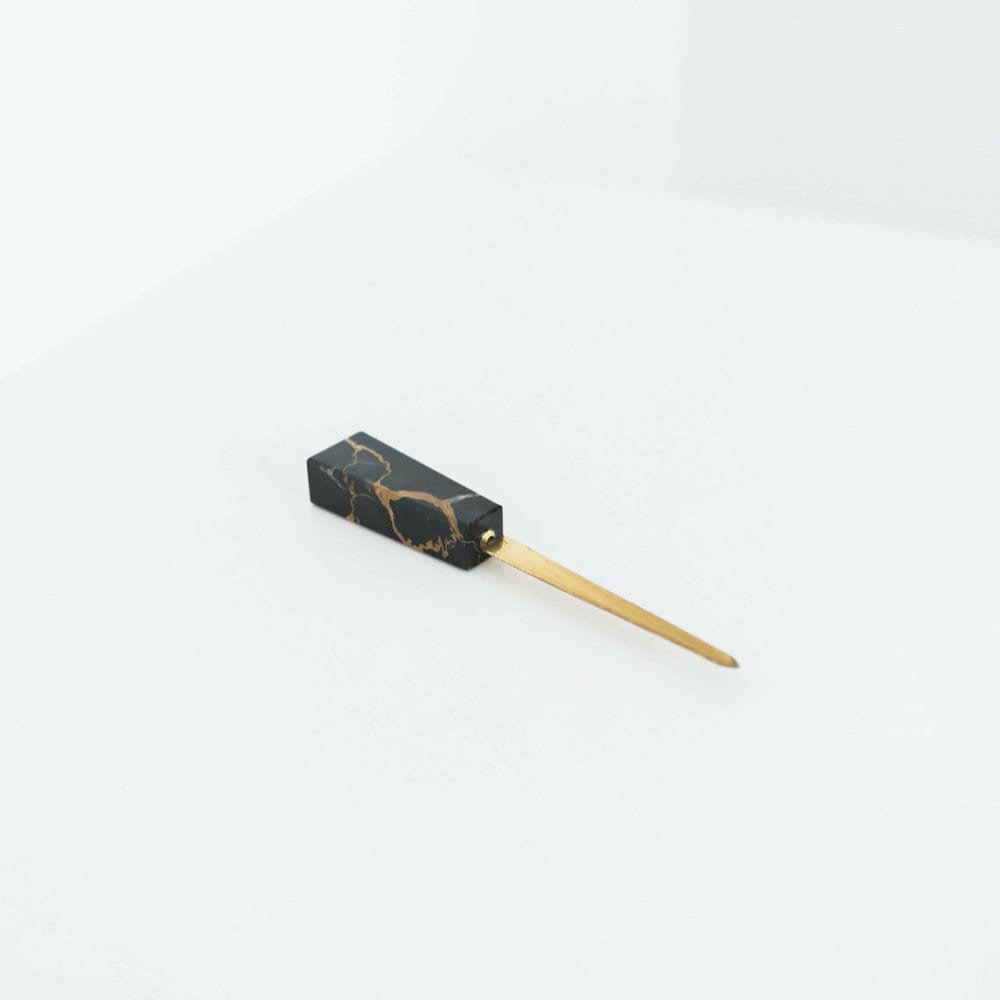 A vintage marble and brass letter opener from Otherwise Shoppe.