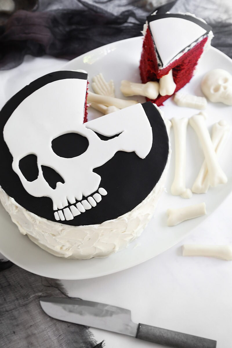 A homemade red velvet skeleton cake