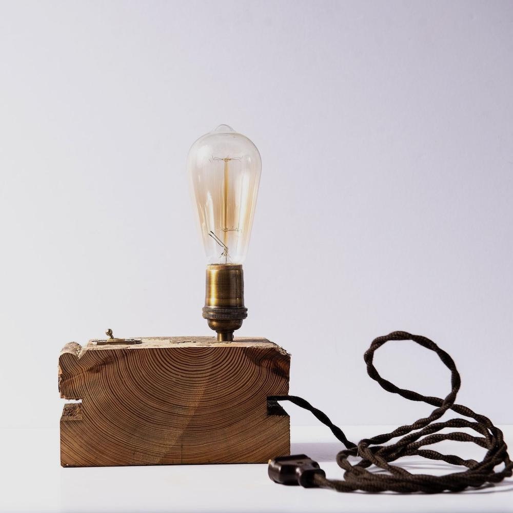 A reclaimed wood desk lamp with Edison bulb from Holtz Leathr Co.