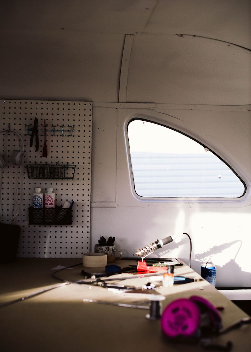 A bright corner of Lauren's studio, featuring her tools and work table