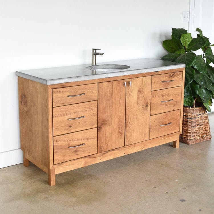 Reclaimed wood bathroom vanity and concrete vanity top from What WE Make