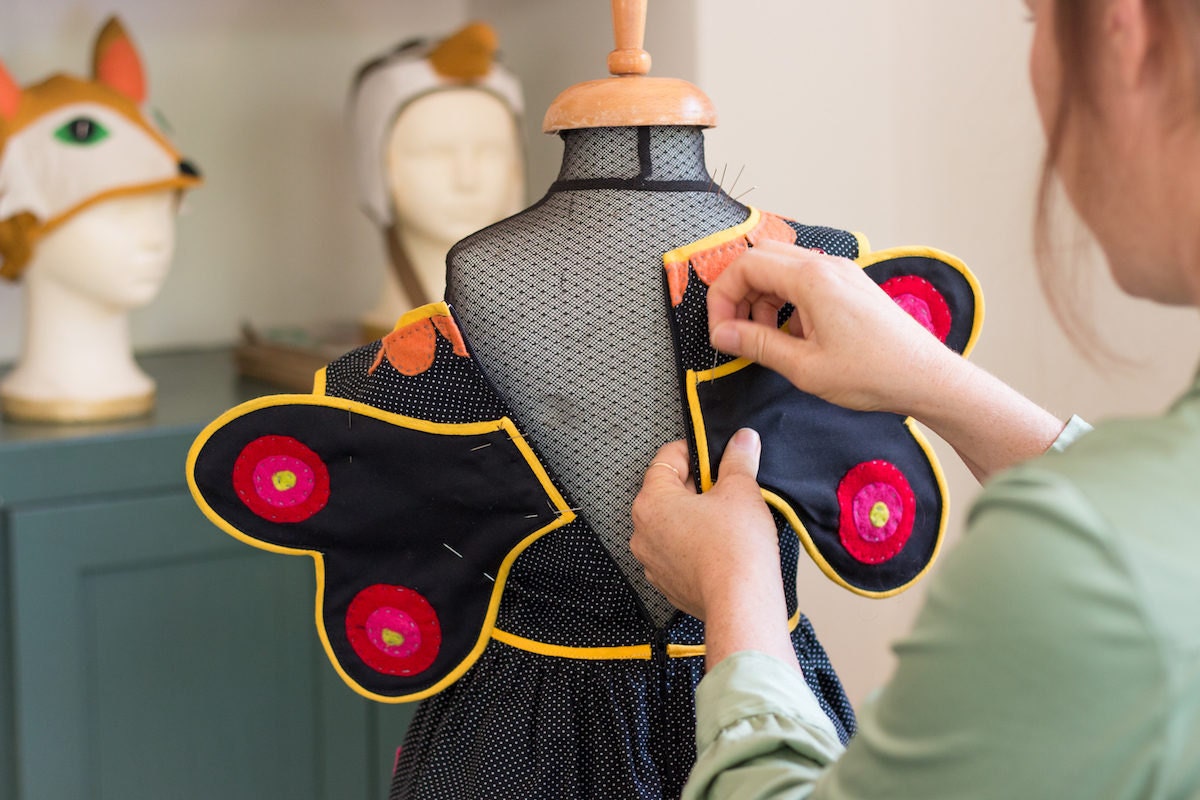 Inbal working on a pair of costume butterfly wings