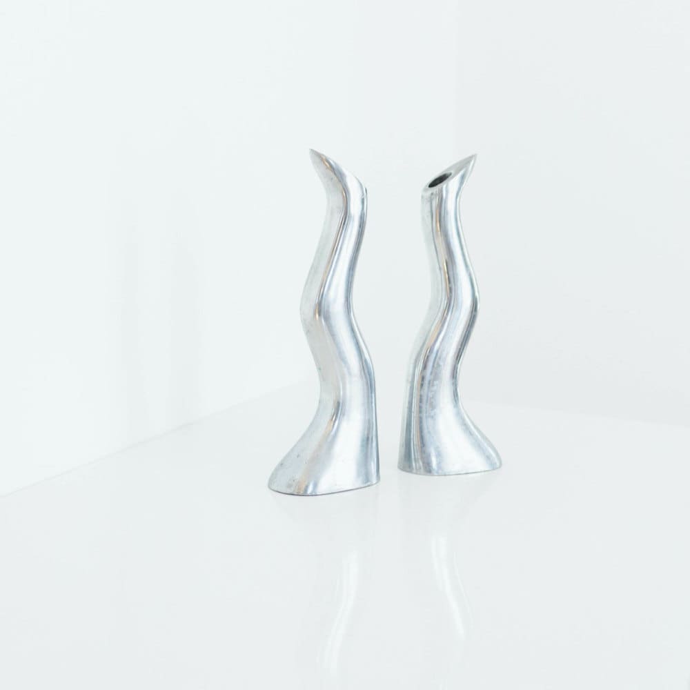 Vintage wavy silver candlesticks from Otherwise Shoppe.