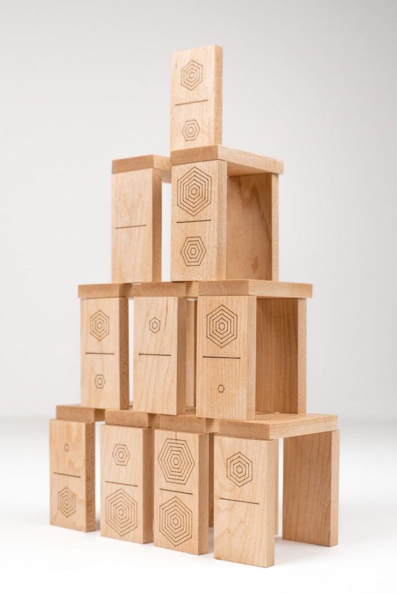 A laser-cut wooden domino set from Atelier-D